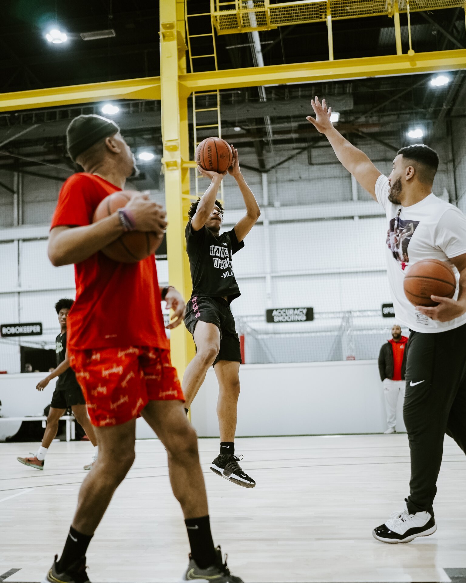 High-level basketball players competing in training